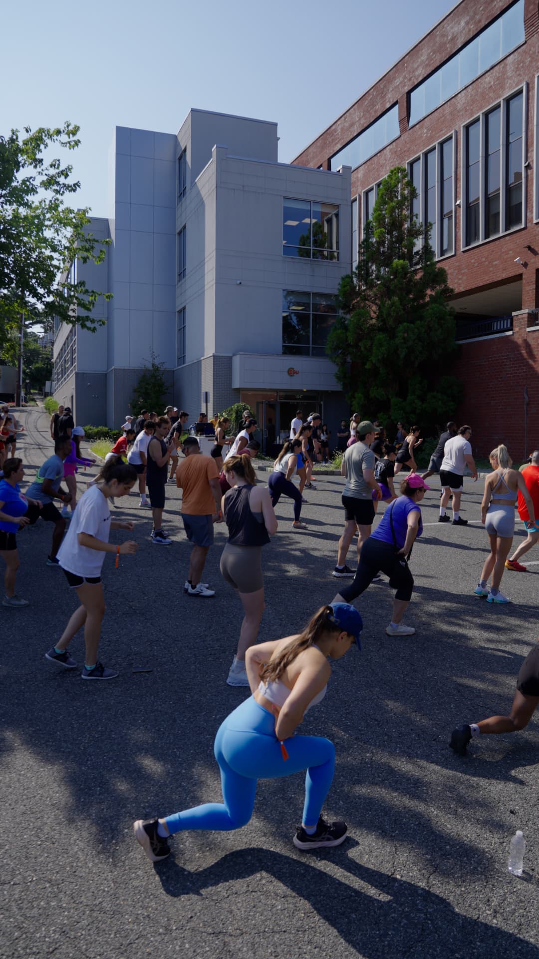 Warm-up drills in the lot before the 5K